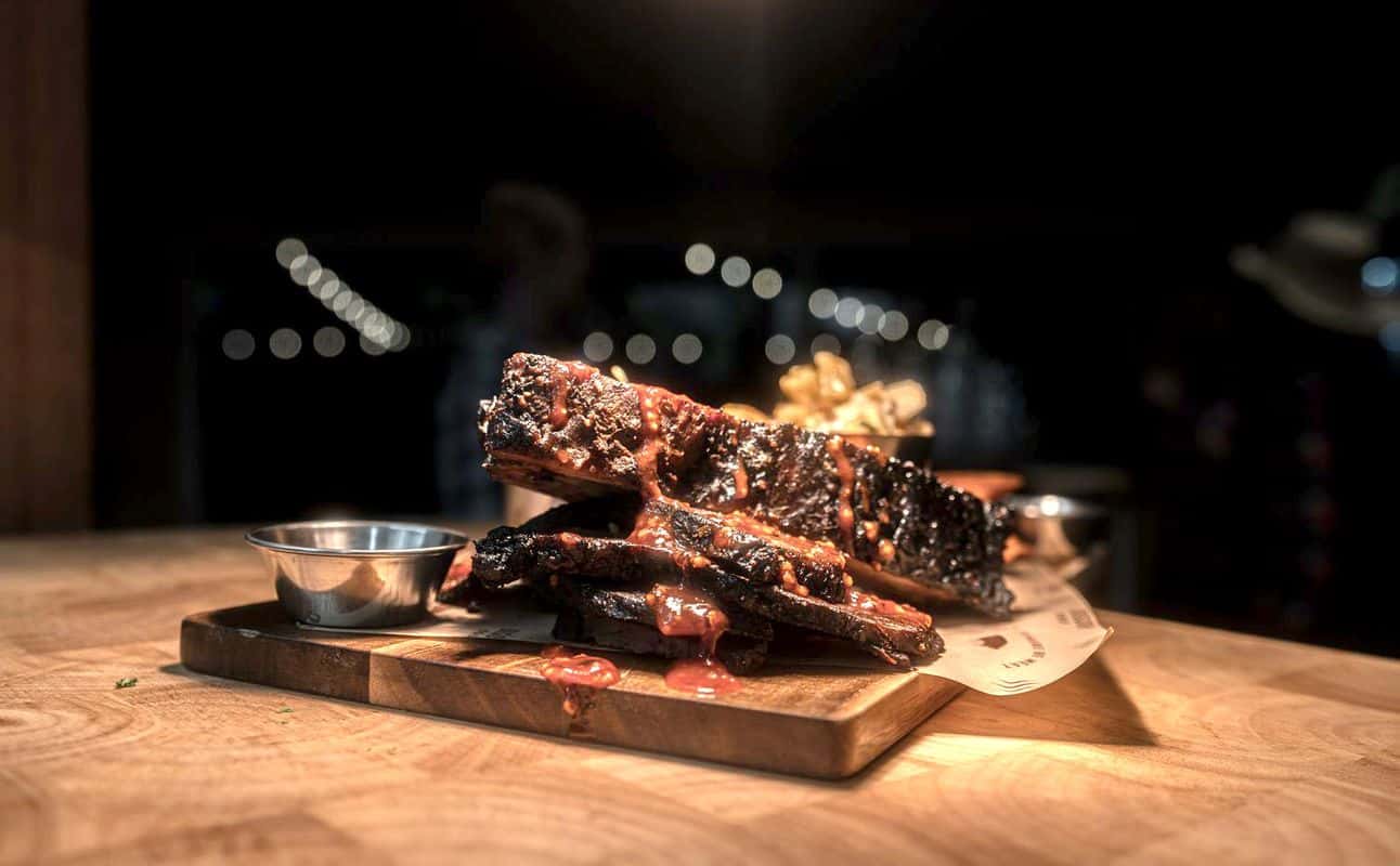 Enjoy New Zealand, Grill & barbeque, Vegetarian options, Dairy free options, Gluten Free options, Restaurant, Table service, Indoor & outdoor seating, Child friendly, Waterfront, Street parking, Dog friendly, $$, Families, Views, Groups and Kids cuisine at Bison BBQ in Ferrymead, Christchurch